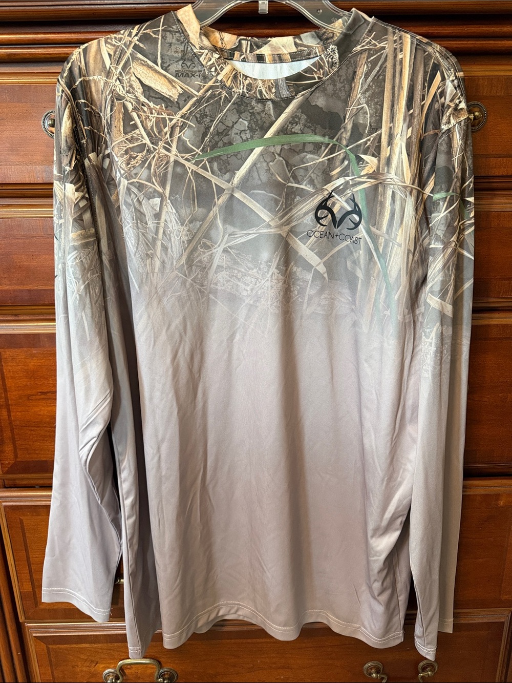 Ocean + Coast dry wicking shirt with Realtree print.